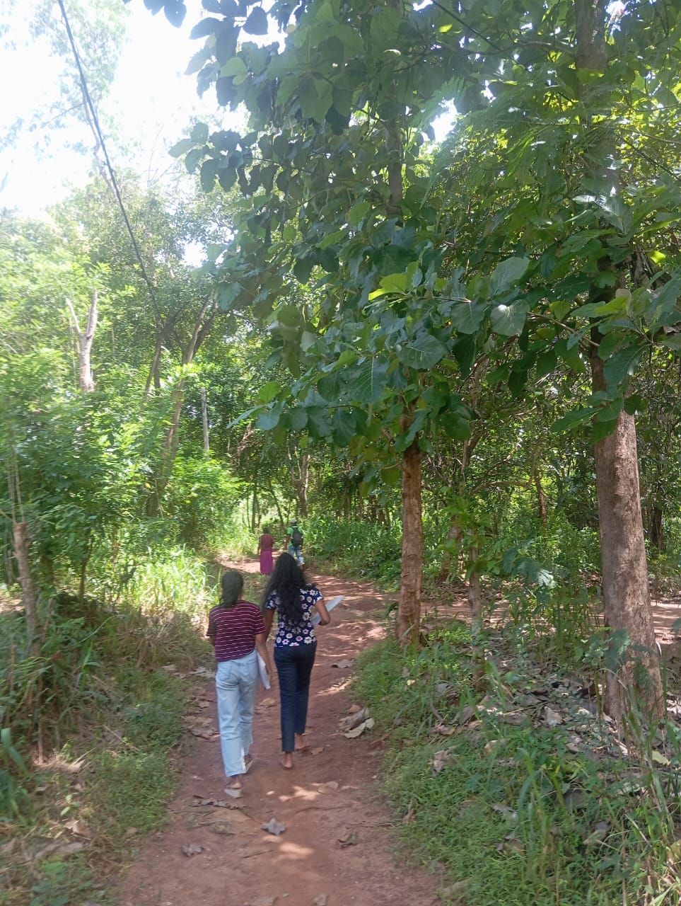 Research team walking to remote village